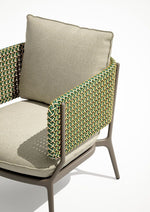 Load image into Gallery viewer, Cesto chair in sage green weave with cream linen seat — front three-quarter view — Minosé