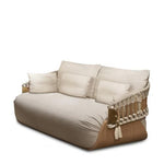 Load image into Gallery viewer, Nicchia chair cream linen — three-quarter view showing sculptural form and leather base — Minosé