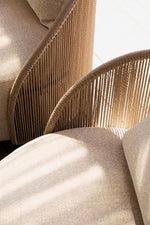 Load image into Gallery viewer, Close-up of Corda chair — hand-woven rope texture and arm detail — Minosé

