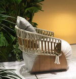 Load image into Gallery viewer, Nicchia chair cream linen — side profile showing woven back panel and tassel detail — Minosé
