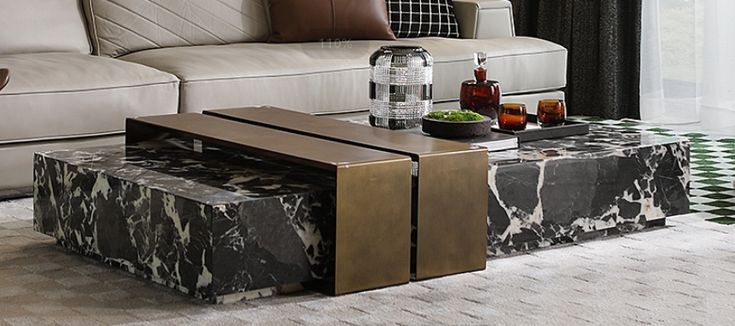Luxury black marble center table with bronze sculptural accents by Minosé