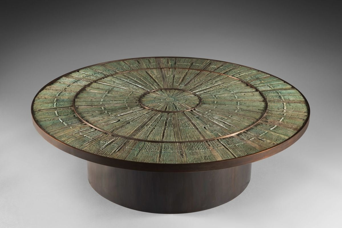 Luxury sculptural round center table with textured green artistic tabletop by minosé