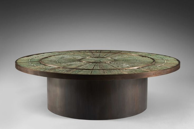 Luxury sculptural round center table with textured green artistic tabletop by Minosé